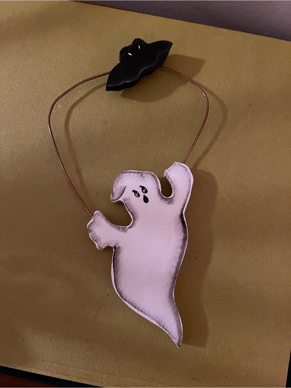 Wooden Ghost and Bat Hanging
